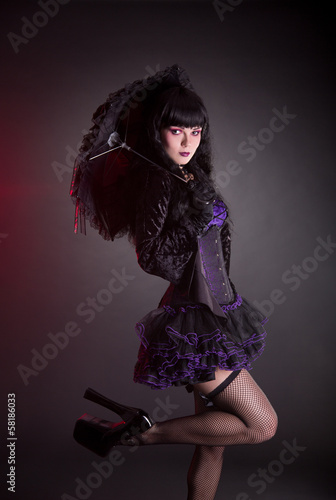 Canvas Print Portrait of gothic Lolita girl with umbrella