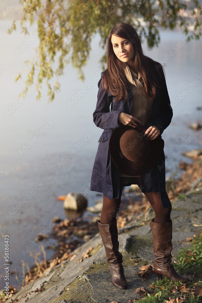 Elegant young woman posing autumn dressed Elegant young woman posing autumn dressed