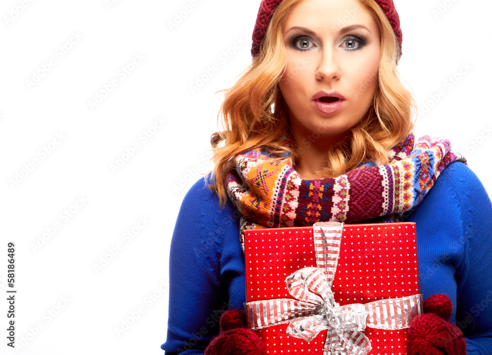 Christmas gift. Surprised beautiful girl Christmas gift. Surprised beautiful girl