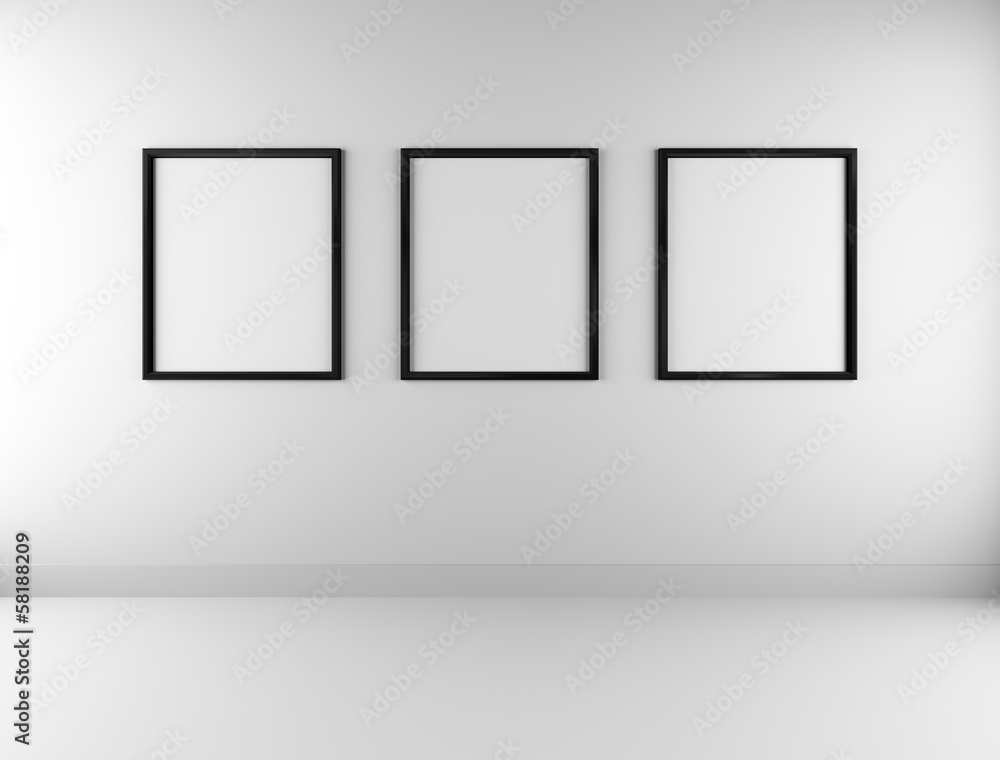 Three blank picture frames on wall Three blank picture frames on wall