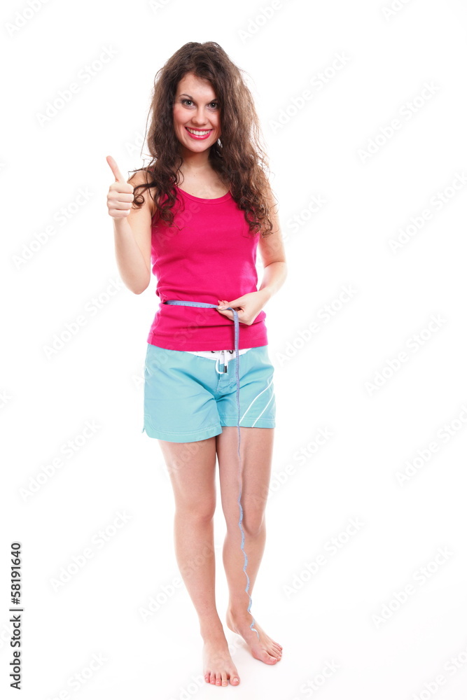 sporty fit woman with measure tape thumbs up sporty fit woman with measure tape thumbs up