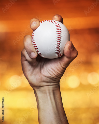 Photography close up of a pitcher hand throws a baseball