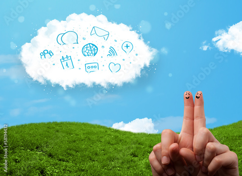 Happy smiley fingers looking at cloud with blue social icons and