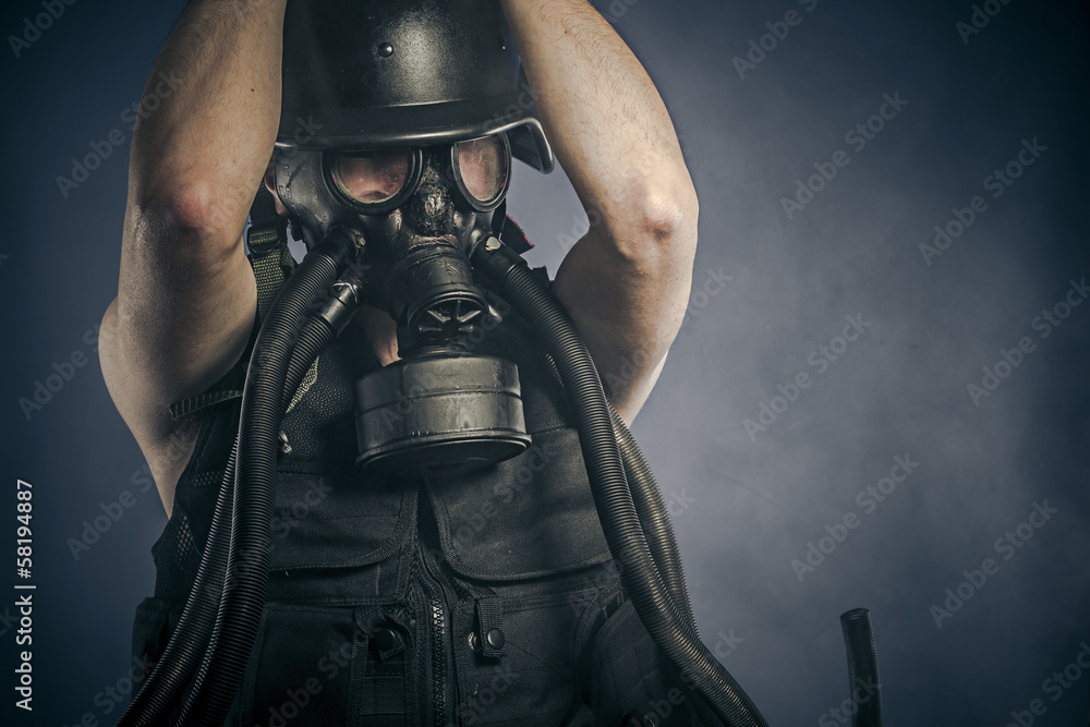 Radiation, nuclear disaster, man with gas mask, protection Radiation, nuclear disaster, man with gas mask, protection