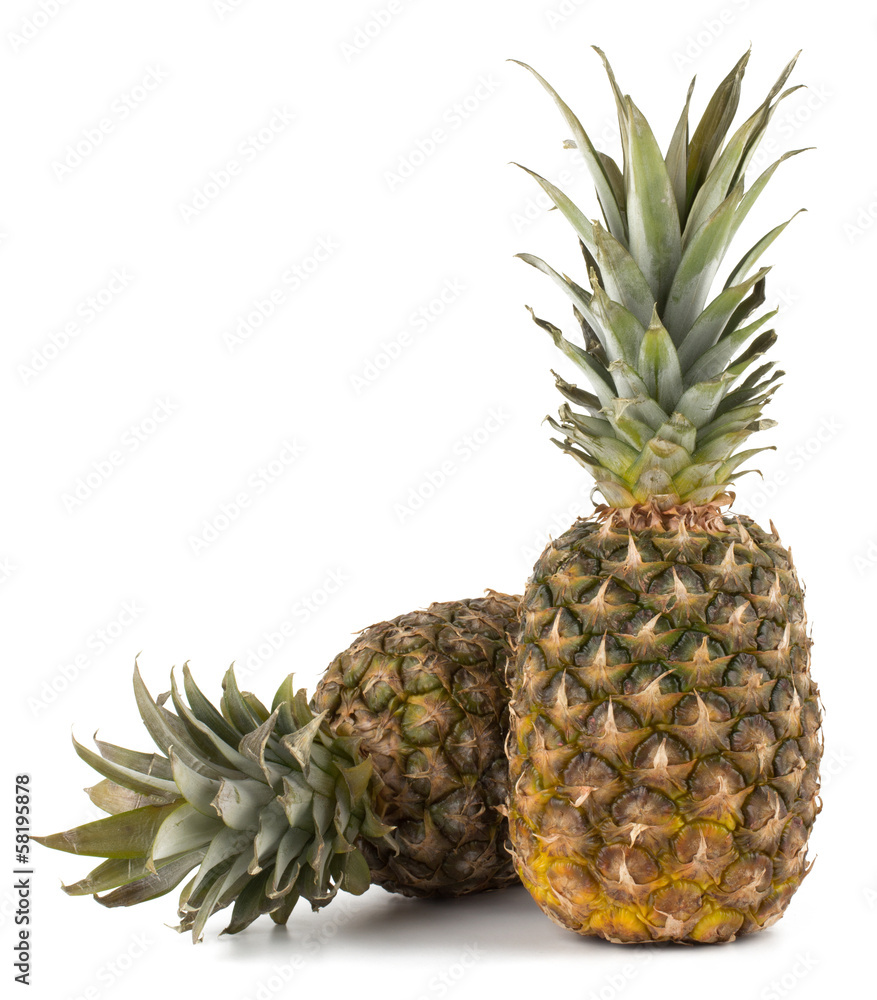 Juicy pineapple with slices isolated on white background Juicy pineapple with slices isolated on white background