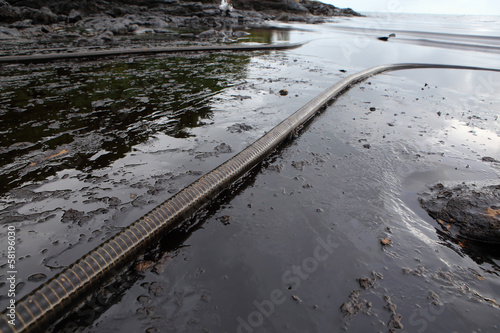 crude oil spill on the beach