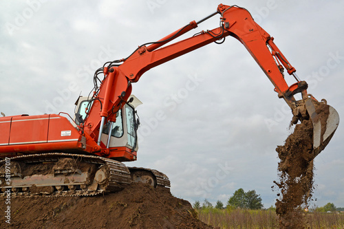 The excavator works at soil movement