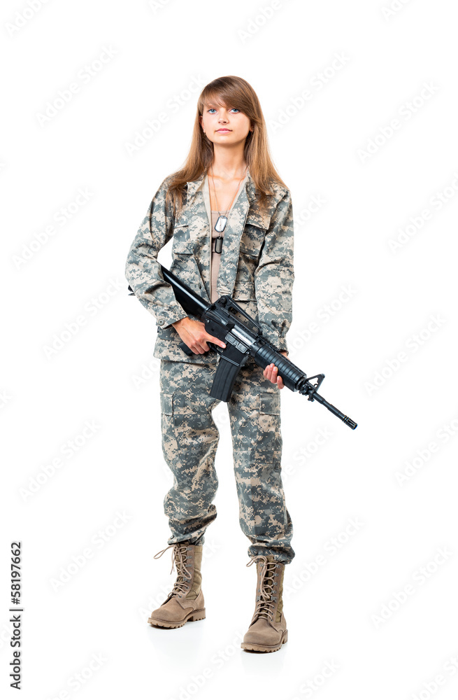 Soldier young beautyful girl dressed in a camouflage with a gun Soldier young beautyful girl dressed in a camouflage with a gun