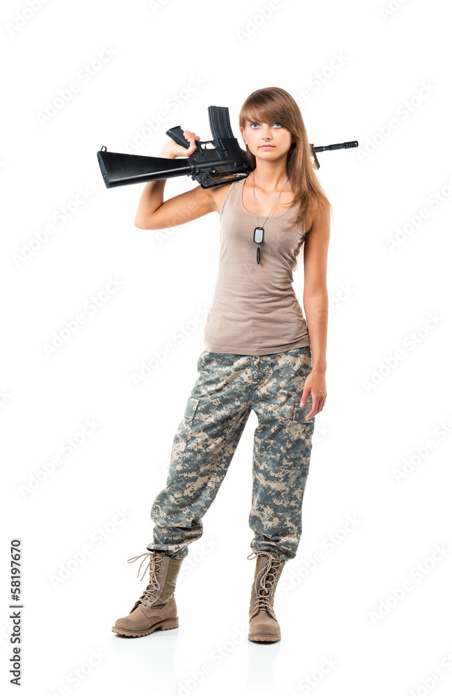 Soldier young beautiful girl dressed in a camouflage with a gun Soldier young beautiful girl dressed in a camouflage with a gun