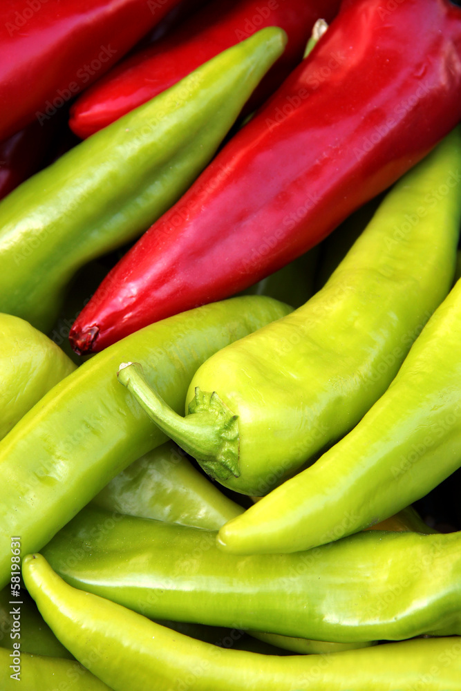 Organic peppers in a pile, bio market concept Organic peppers in a pile, bio market concept