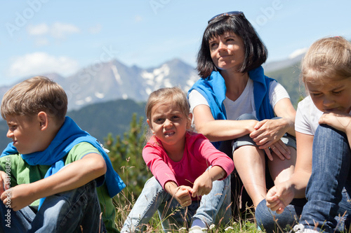 Family relaxing in the mountain