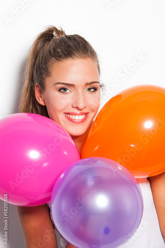 smiling girl and balloons