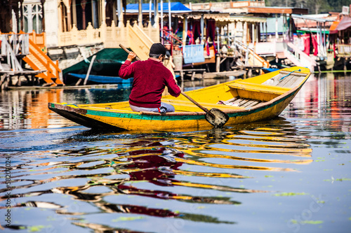 Shikara boat in Dal lake , Kashmir India © Curioso.Photography