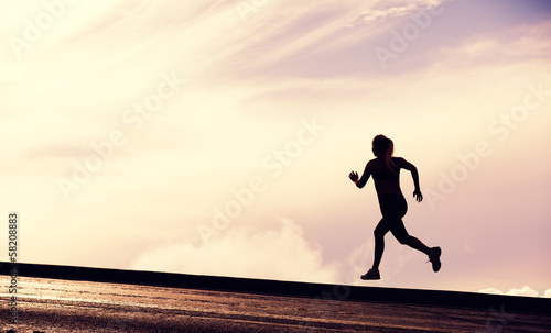 Fototapeta Naklejka Na Ścianę i Meble -  Female Runner Silhouette, Woman Running into sunset, colorful su