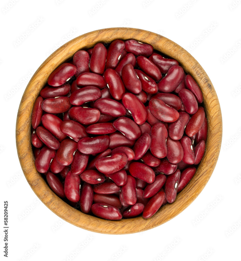 dried red beans in a wooden bowl isolated on white background dried red beans in a wooden bowl isolated on white background
