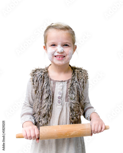 Funny girl with rolling pin