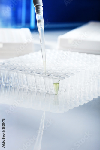 Fotografie Plastic tubes for DNA amplification and loading pipette