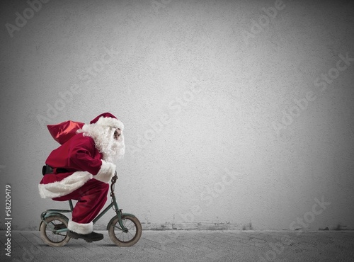 Fast Santa Claus on the bike
