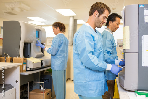 Researchers Working In Laboratory