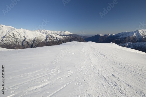 Candid ski tour slope in scenic valley © fabio lamanna