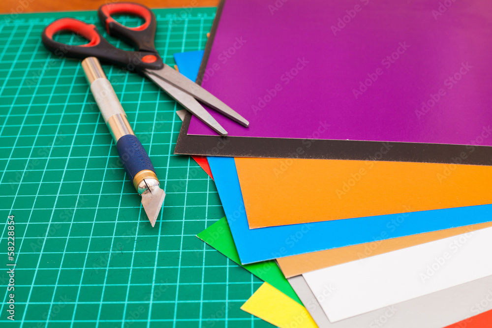 Cutting mat with paper and tools Cutting mat with paper and tools