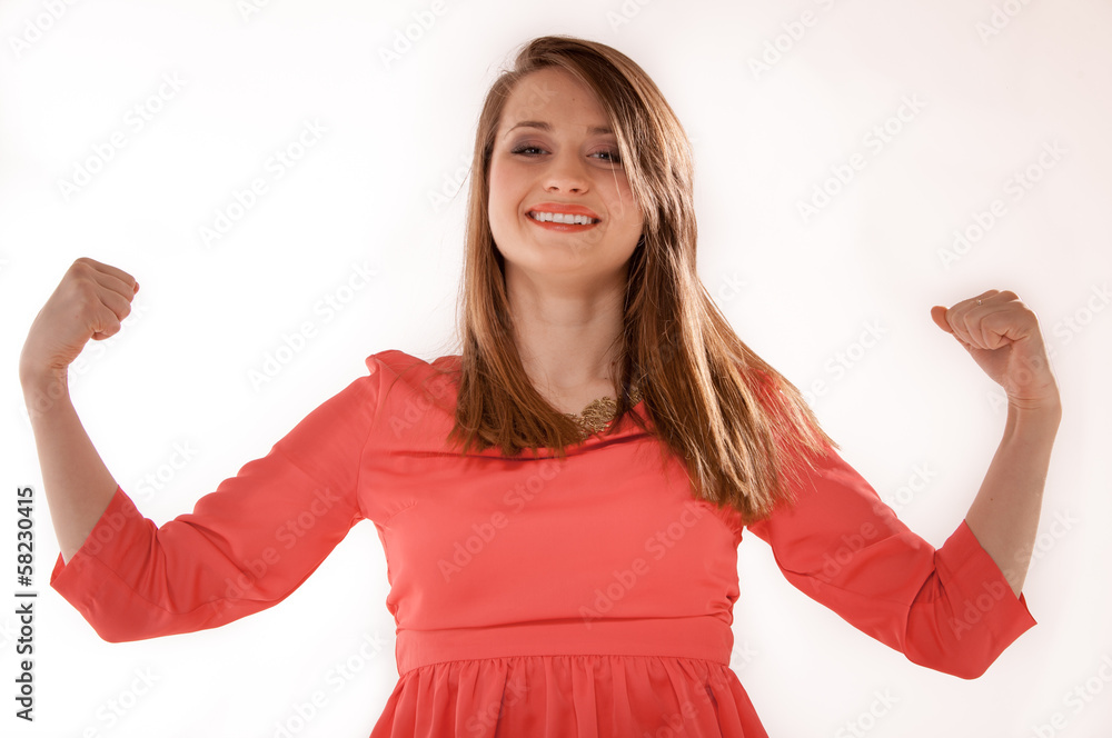 Girl showing her muscles strength and power Girl showing her muscles strength and power