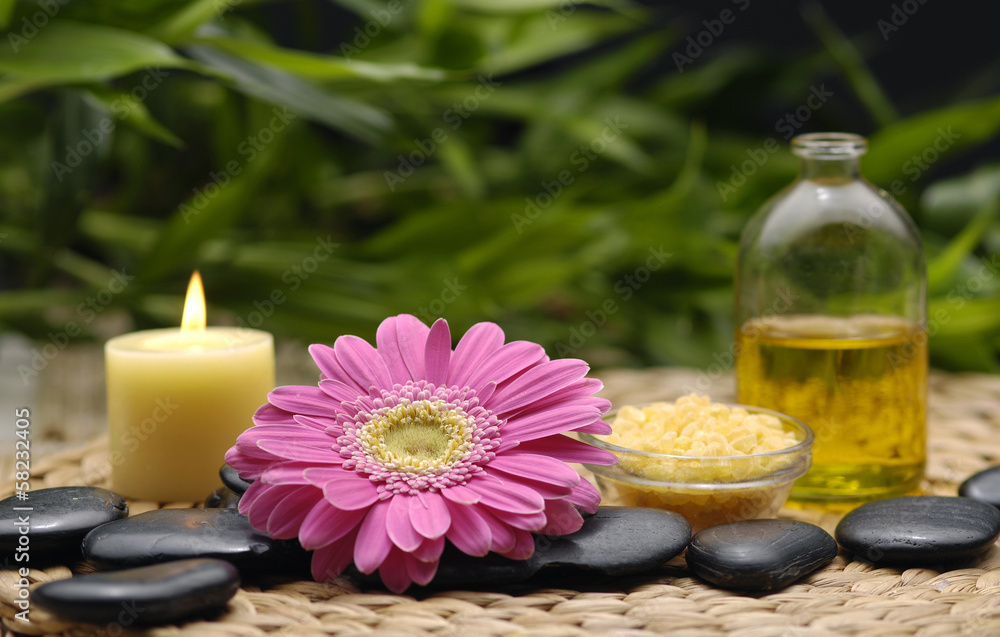 spa salt in spoon with orchid and flower with candle spa salt in spoon with orchid and flower with candle