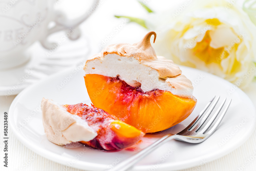 Baked peach with meringue