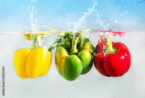 The colorful capsicum or bellpepper in the water
