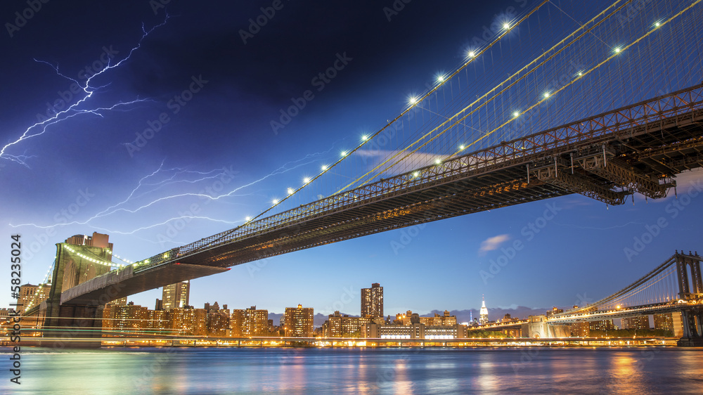Fototapeta premium Brooklyn, New York. Night colors with storm over main city landm