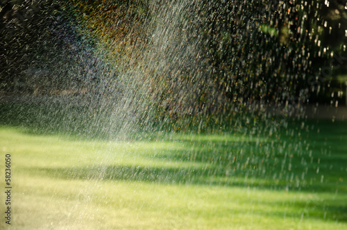 rainbow over watering lawn