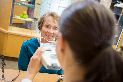 Woman Getting An Eye Test From Optometrist