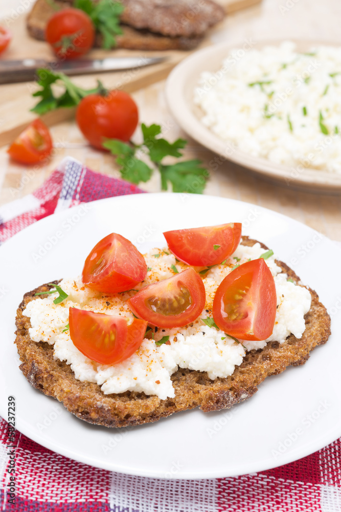 sandwich with homemade cottage cheese, pepper, herbs and cherry