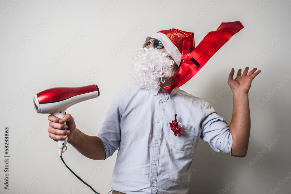 © Eugenio Marongiu - funny santa claus babbo natale with hairdryer © Eugenio Marongiu - funny santa claus babbo natale with hairdryer