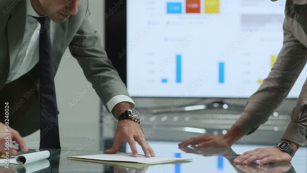 business men shaking hands in office meeting room business men shaking hands in office meeting room