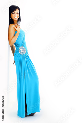 young woman in blue dress posing in studio © ASDF