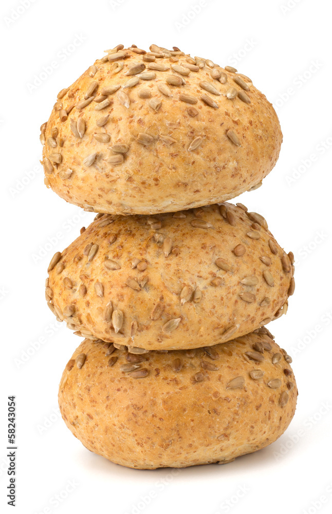Round sandwich bun with sunflower seeds isolated on white backgr Round sandwich bun with sunflower seeds isolated on white backgr