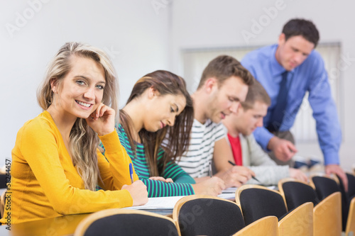 Teacher with students at the classroom