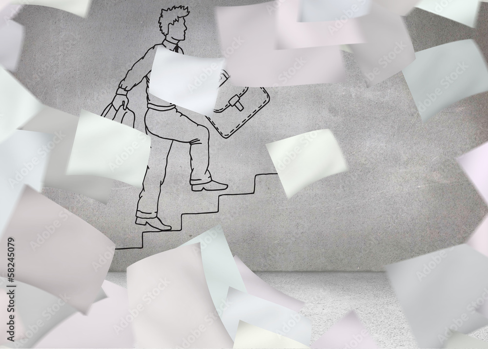 Papers in front of grey wall with comic man Papers in front of grey wall with comic man