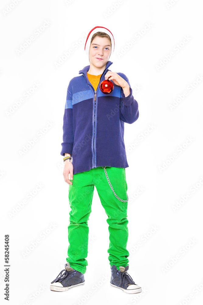 smiling teenage boy with santa claus hat holding a red christmas smiling teenage boy with santa claus hat holding a red christmas
