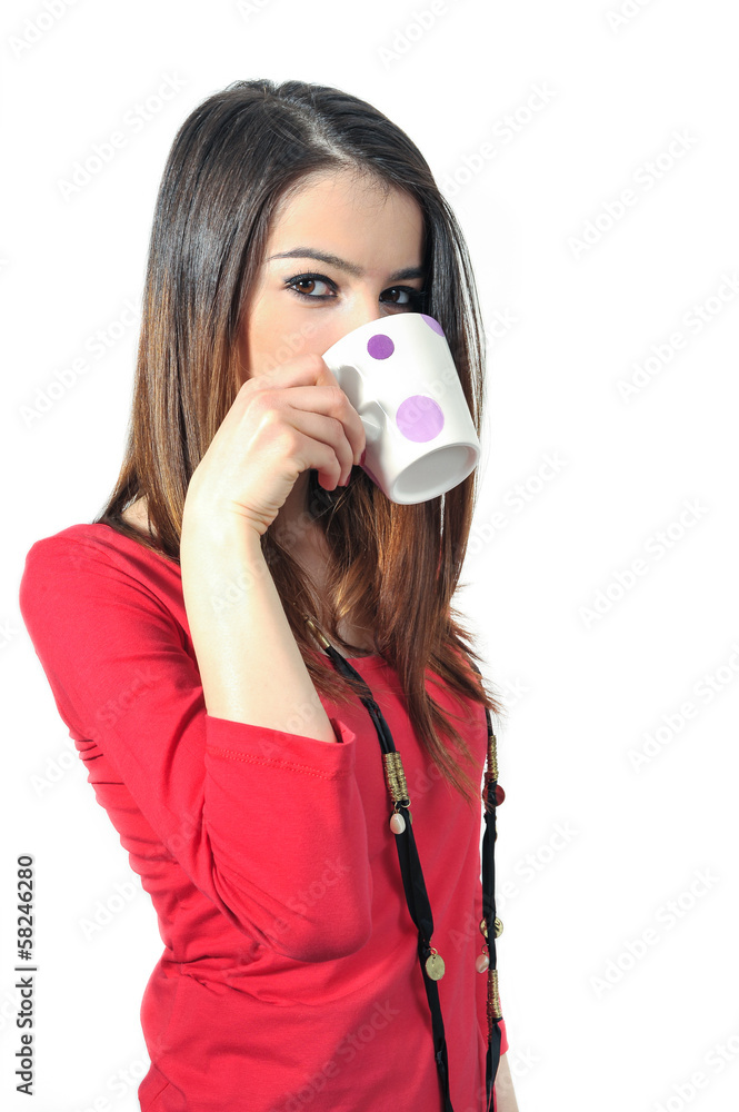 Isolated young girl drinking coffee by mug on white background Isolated young girl drinking coffee by mug on white background