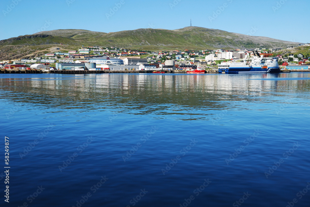 Blue water of fjord against the northernmost city Hammerfest.