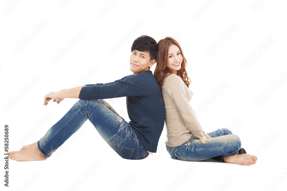 young couple sitting together young couple sitting together