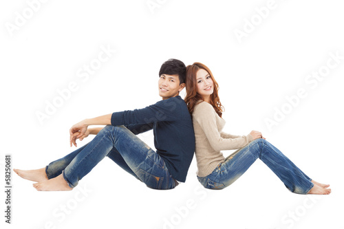 young couple sitting together