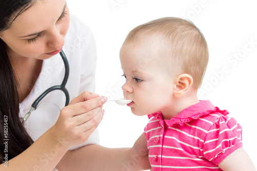 doctor giving remedy to bab...