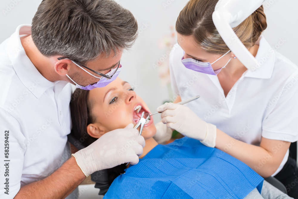 Patient with Dentist - dental treatment Patient with Dentist - dental treatment