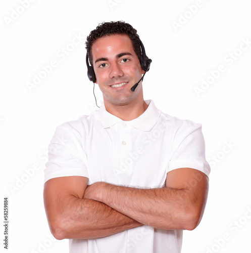 Adult guy with earphone crossing his arms