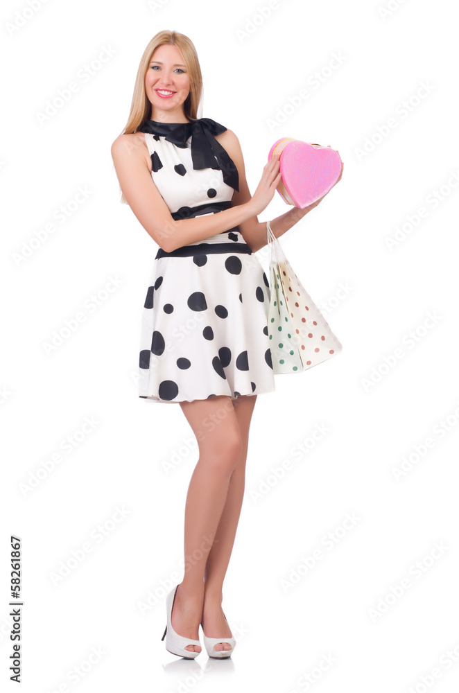 Young woman with christmas shopping on white Young woman with christmas shopping on white