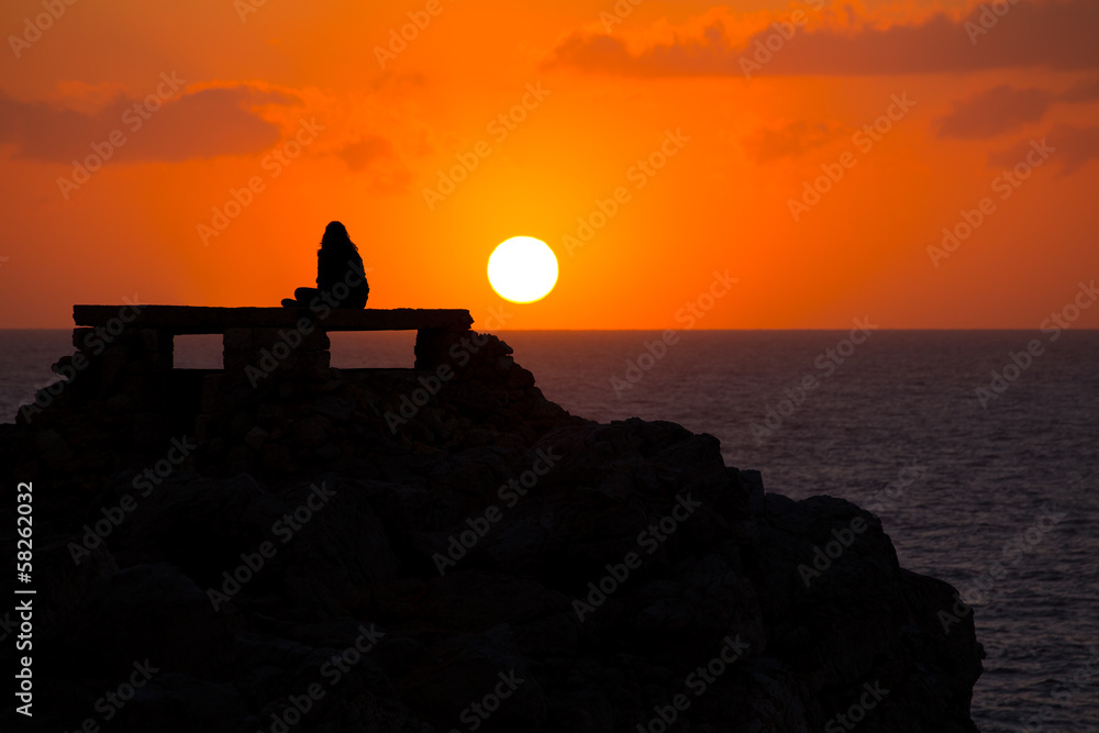 Ciutadella Menorca at Punta Nati sunset with girl