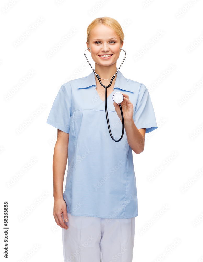 smiling female doctor or nurse with stethoscope smiling female doctor or nurse with stethoscope